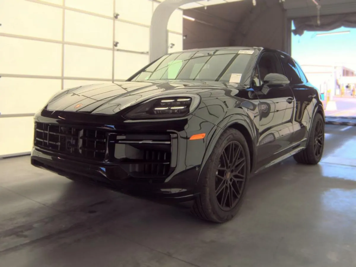 Dark Porsche Cayenne SUV bought by Cameron Motorsports