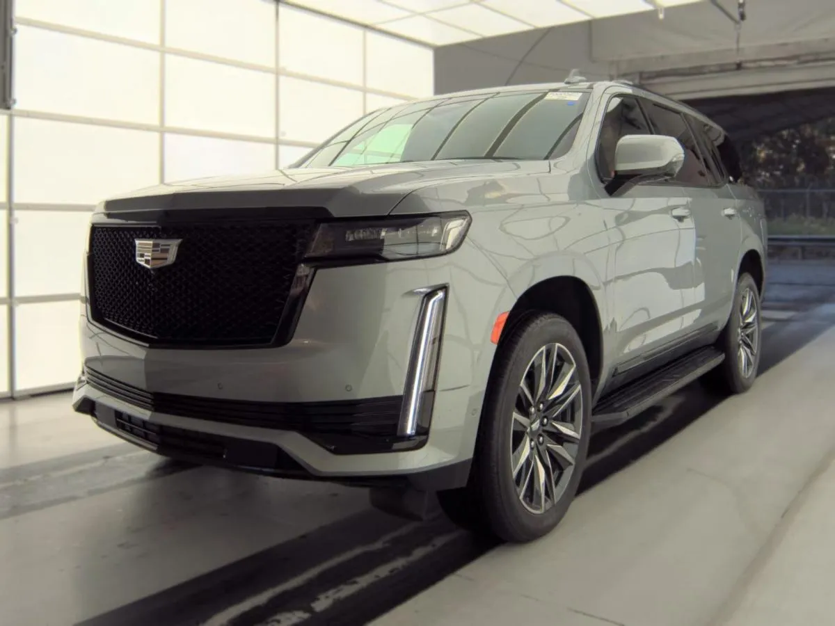 Silver Cadillac Escalade SUV bought by Cameron Motorsports