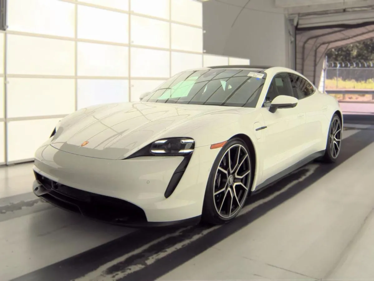 White Porsche Taycan bought by Cameron Motorsports